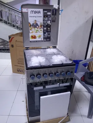 Mika 50 by 60 3 Gas and 1 Electric Cooker