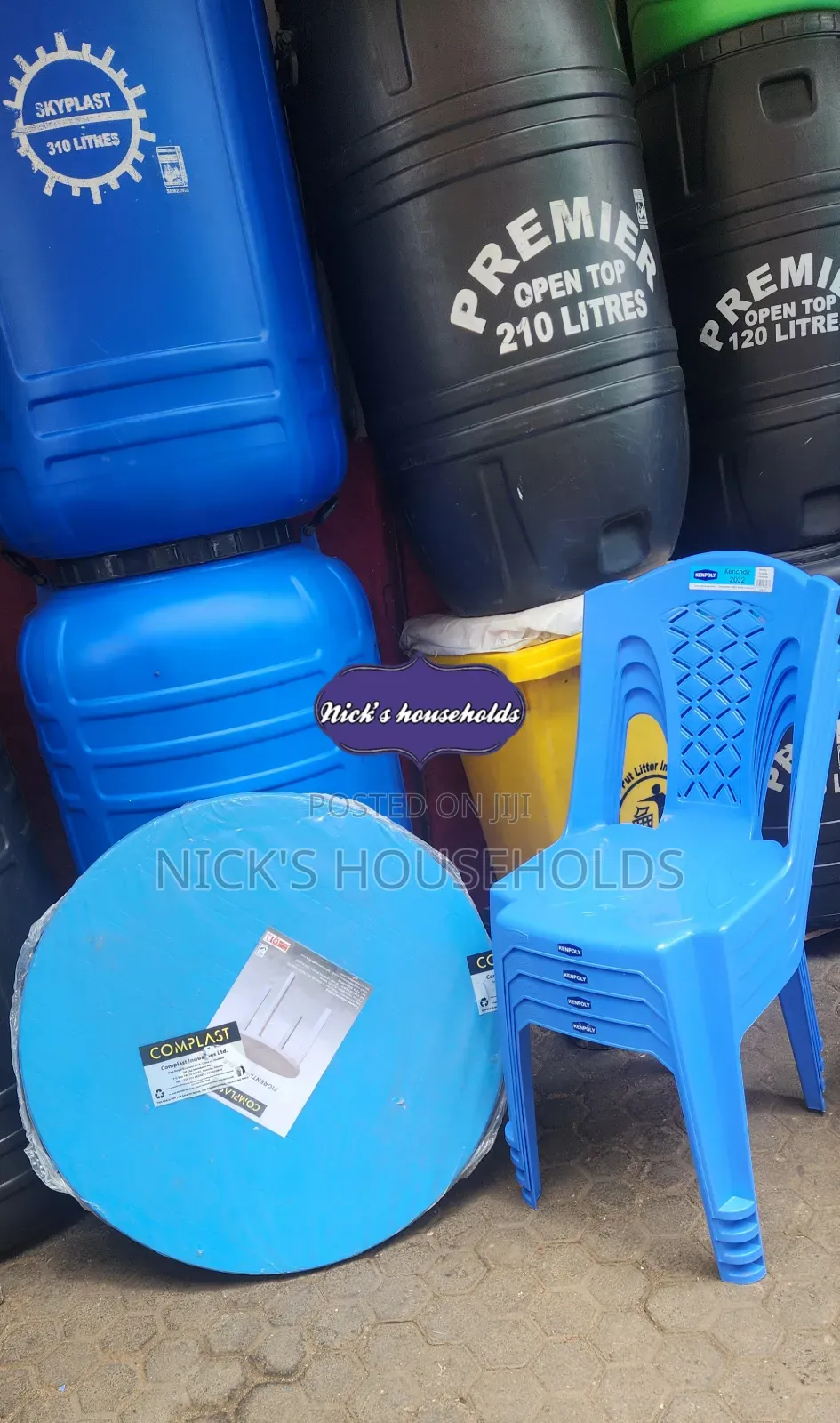 One Round Plastic Table With 4 Armless Plastic Chairs