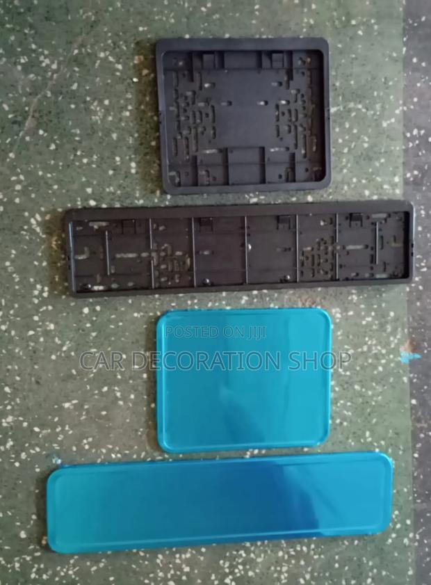 A Set of Plastic or Metallic Number Plates Mounts