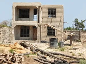 Plot and Incomplete House for Sale