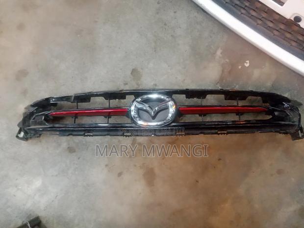 Ex Japan Mazda Demio Grill - main view