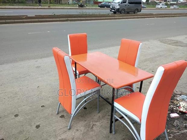 Restaurant And Bar Orange Chairs And Table