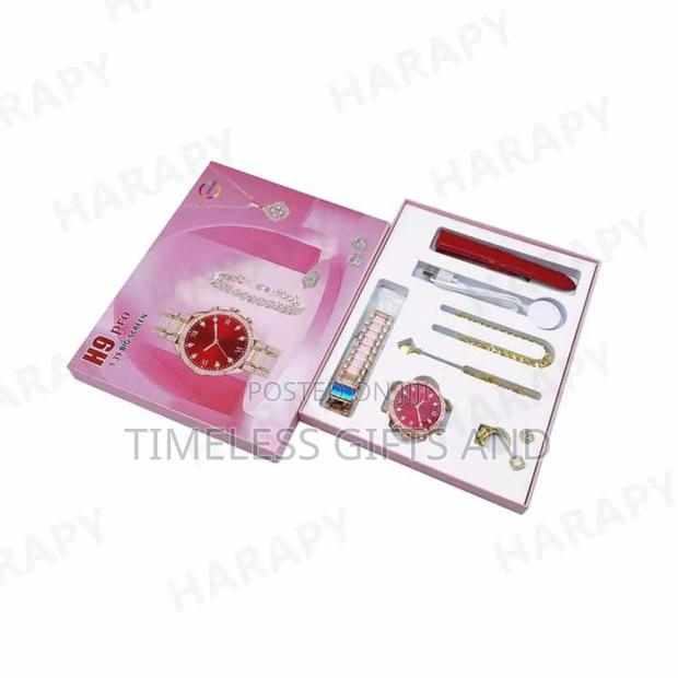 H9 Pro Pink Smart Watch and Gold Accessories