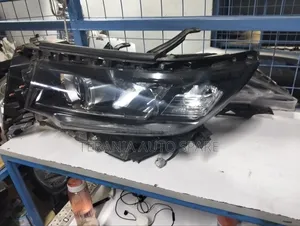 Prado 165 Headlight Letter J