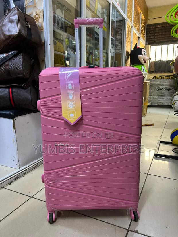 Hot Pink Large Size Quality 72cm Rubber Suitcase at 4500 Kes