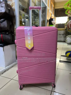 Hot Pink Large Size Quality 72cm Rubber Suitcase at 4500 Kes