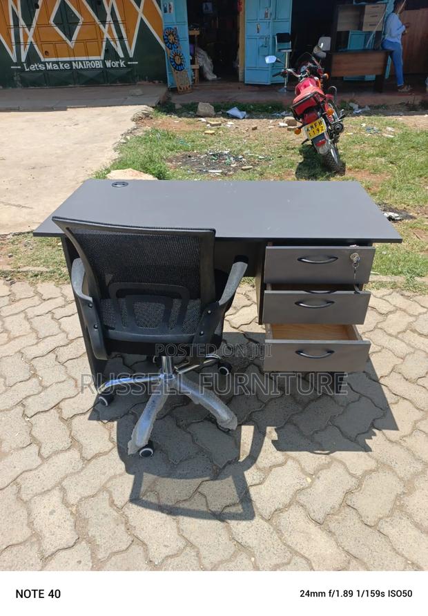 Well Furnished Grey Study Table and Mesh Study Chair