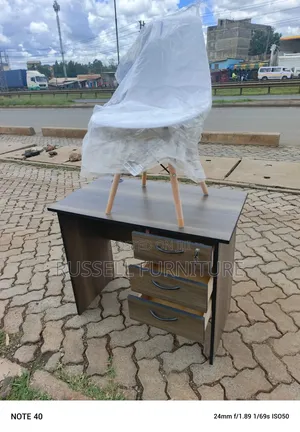 American Study Table and White Eames Chair