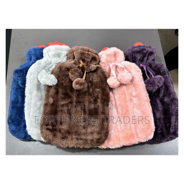 Hot Water Bottle With Fleece Cover. - main view