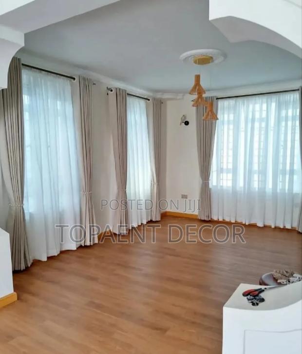Bright Window Eyelates Curtains and Plain White Sheers - main view