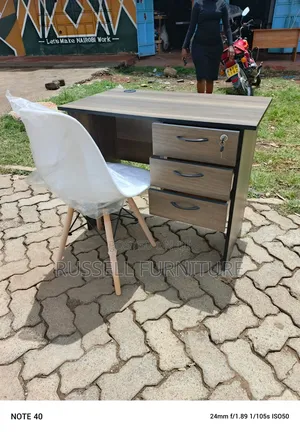 White Imported Eames Chair and Study Table