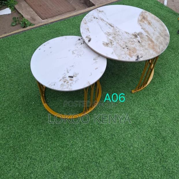 Dining Table: Round Nesting Marble Dining Table