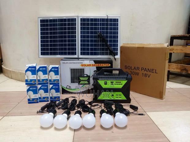 6 Bulbs Solar Home Lighting System Can Power 24" Tv