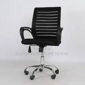 Office Chair: Low Mesh Chair With Fixed Arms -Rolling