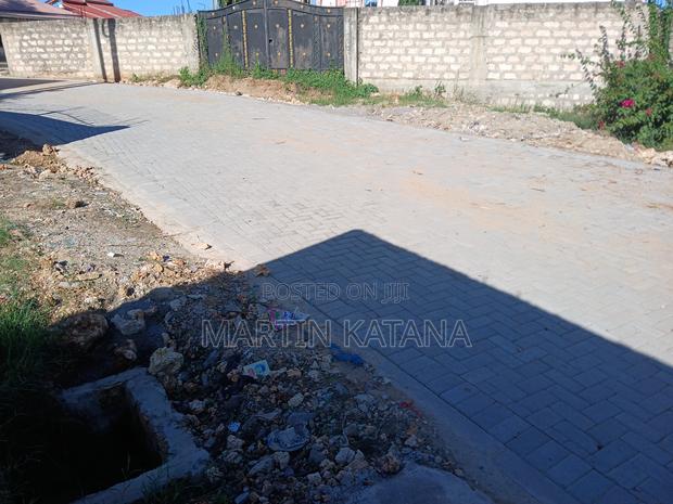 Block Fenced and Gated Plot, With Basic Building Foundation - thumbnail 8