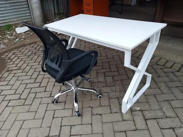 Mesh Office Chair and All White Table