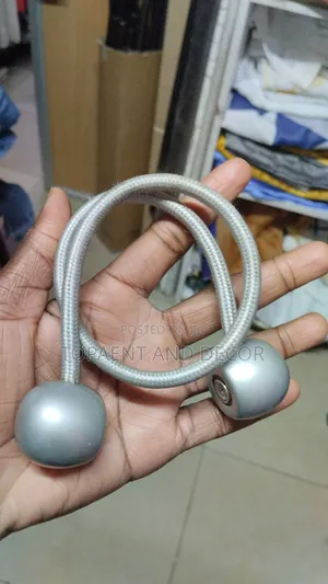 Pair of Curtains Holder Available for Elegant Curtain