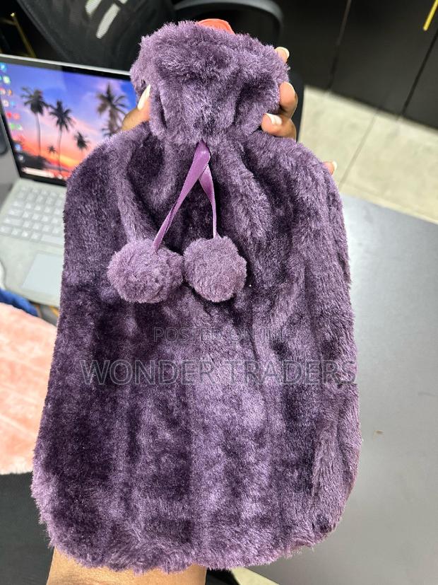 *Hot Water Bottle With Fur Fleece Cover*
2 Litres