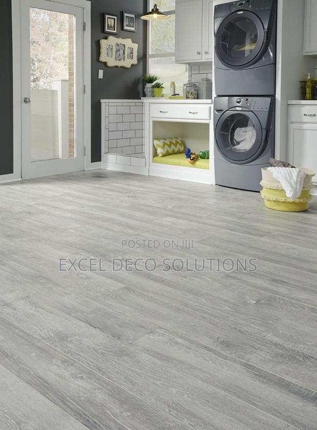 "No Creaks. No Cracks. Just Class." SPC Flooring