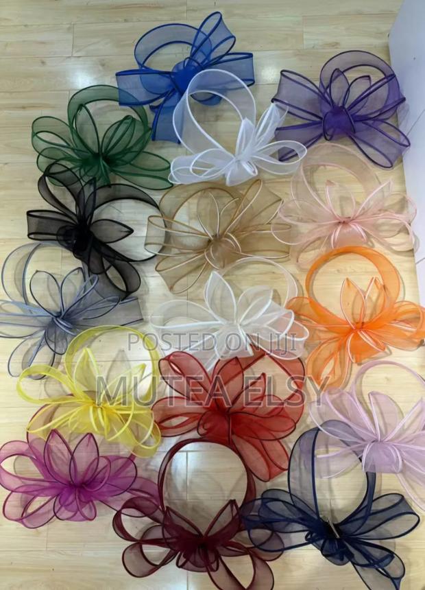 Emelard Green, Orange Coffee Brawn Executive Fascinators - main view