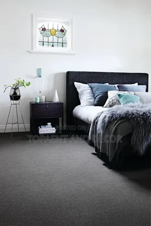 Simple Bedroom With Wall to Wall Carpet