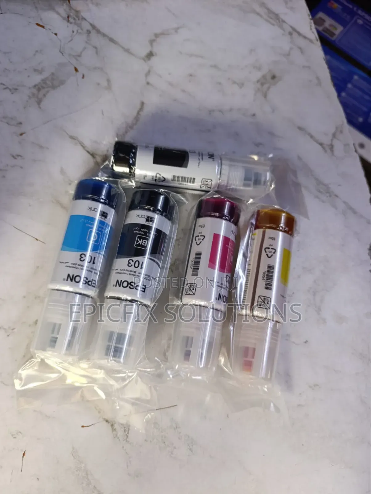A Set of Epson Original Epson Inks for Ecotank Printers