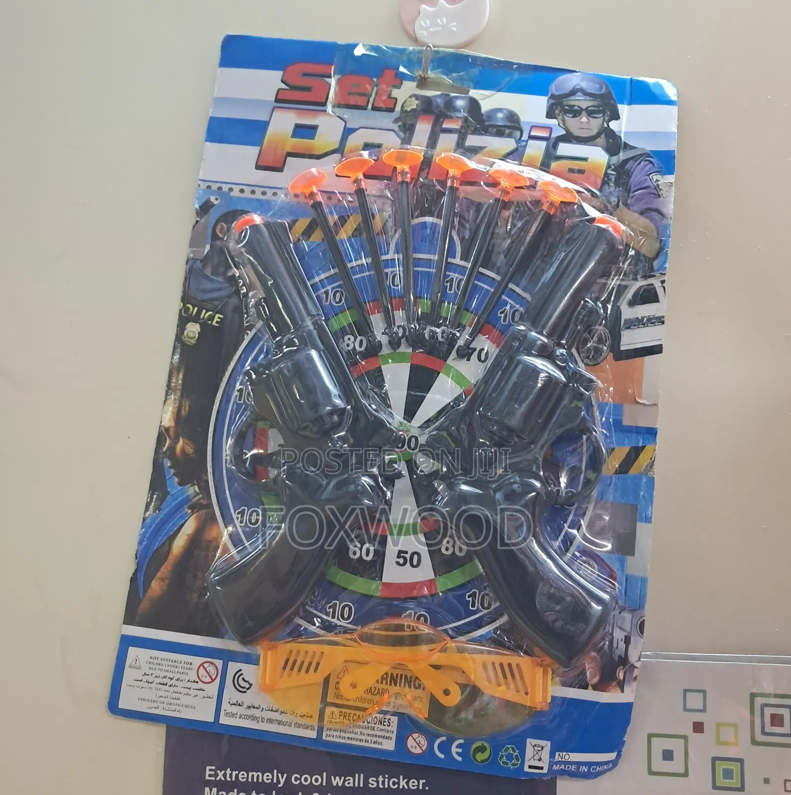 A Toy Police Set, Including Toy Guns and Darts