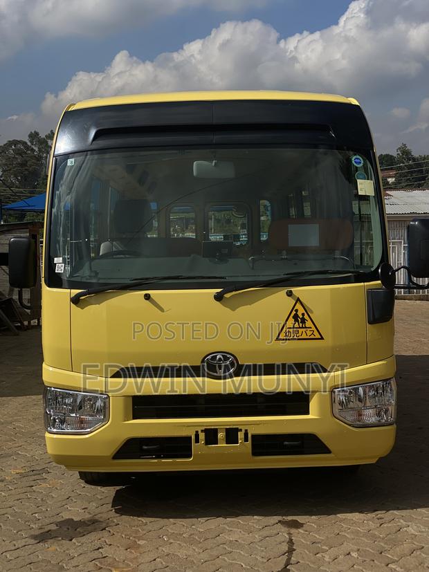 Toyota Coaster 2019 Yellow