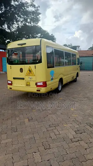Toyota Coaster 2020 Yellow