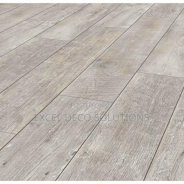 "From Bare to Beautiful in No Time!" Laminate Flooring