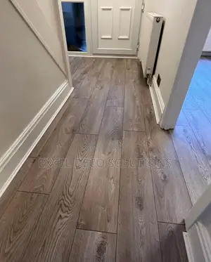 "Looks Like Wood, Works Like Magic!" Laminate Flooring