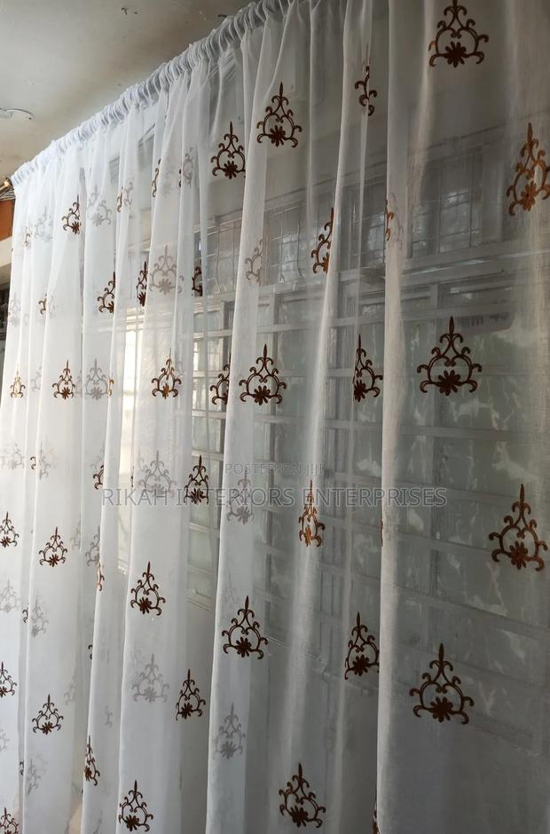 Sheer With Brown Details