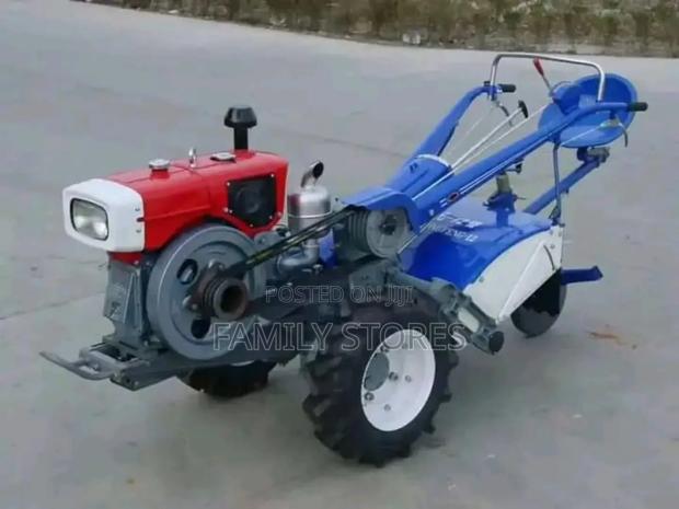 Jd 16hp Diesel Walking Tractor With Accessories.