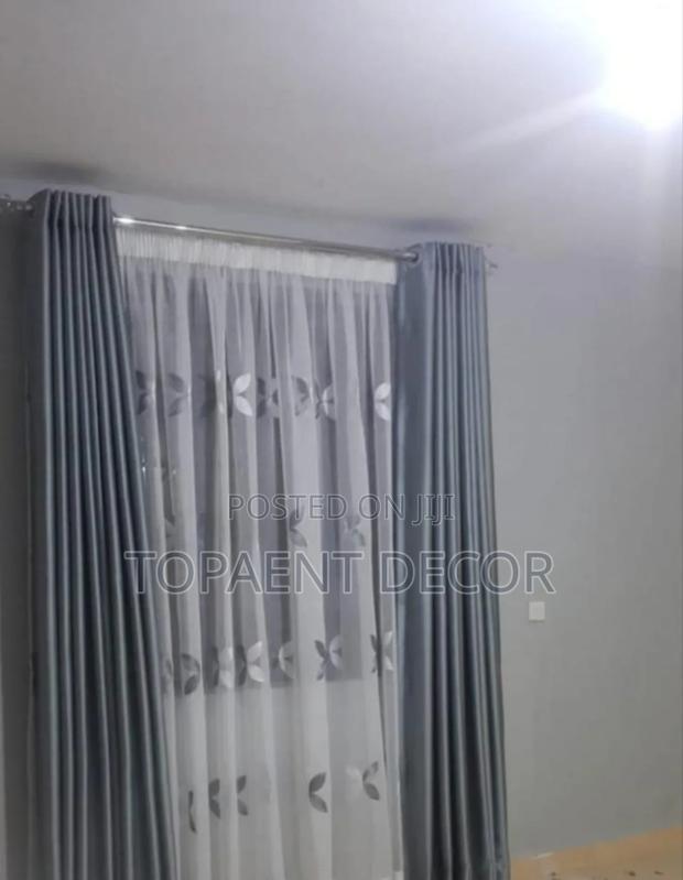 Grey Paired Window Curtains With White and Grey Window Sheer