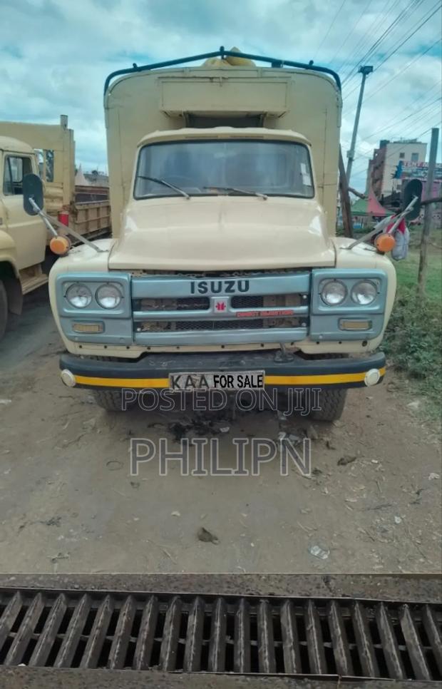 Isuzu HTR 1992 Beige - thumbnail 4