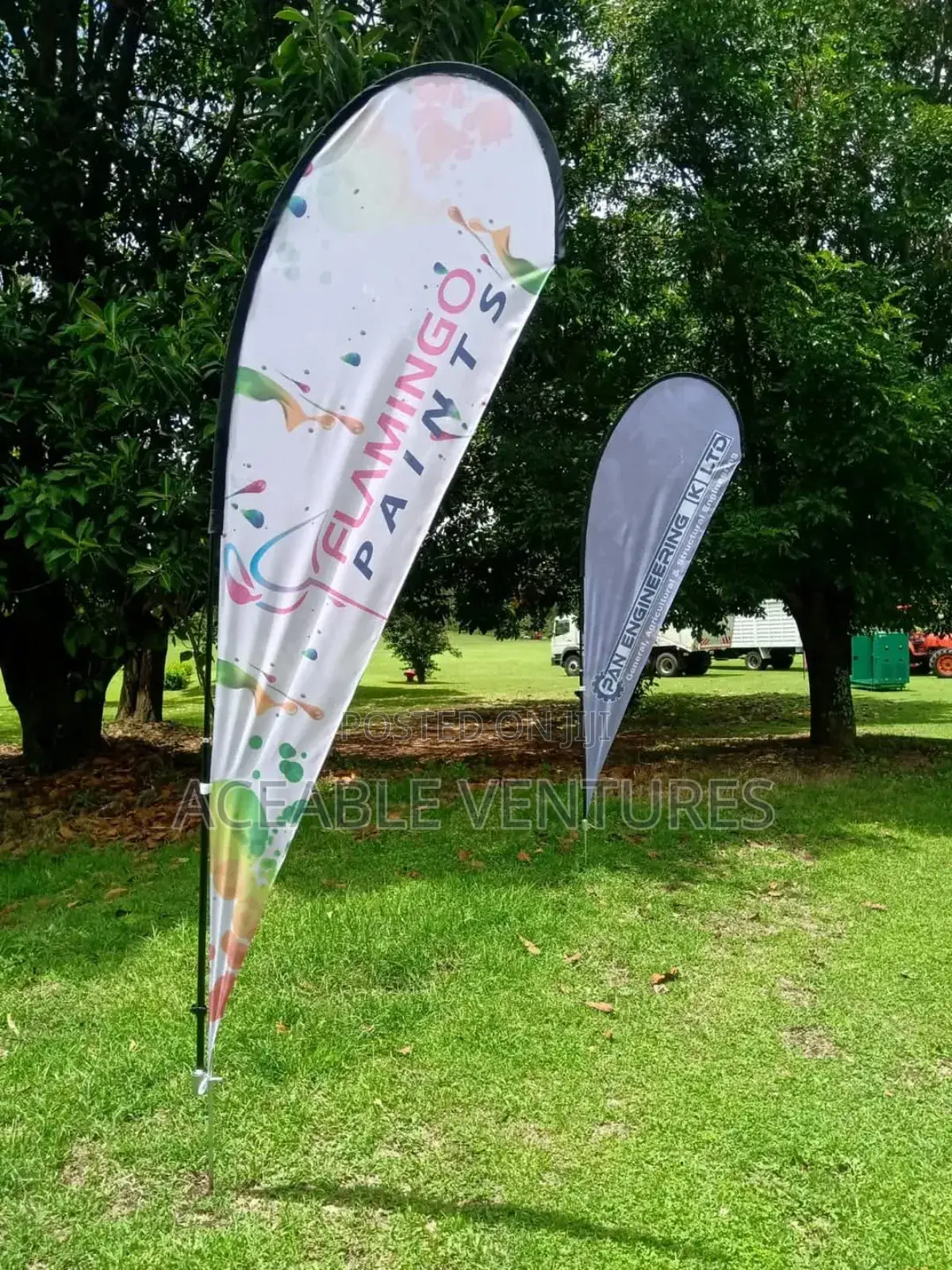 Teardrop Banner Advertising in an Open Field