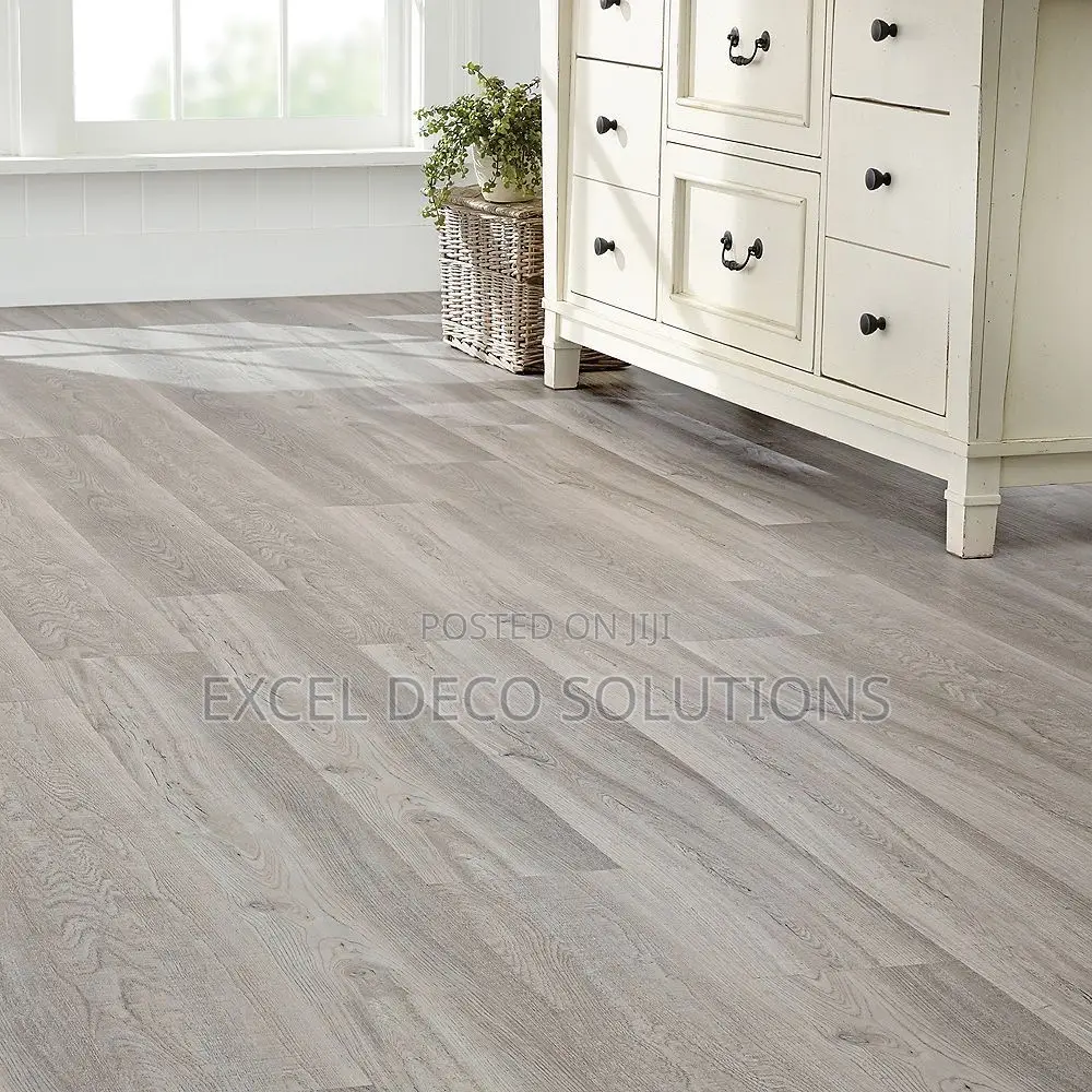 "Tough. Stylish. Unstoppable." Laminate Flooring