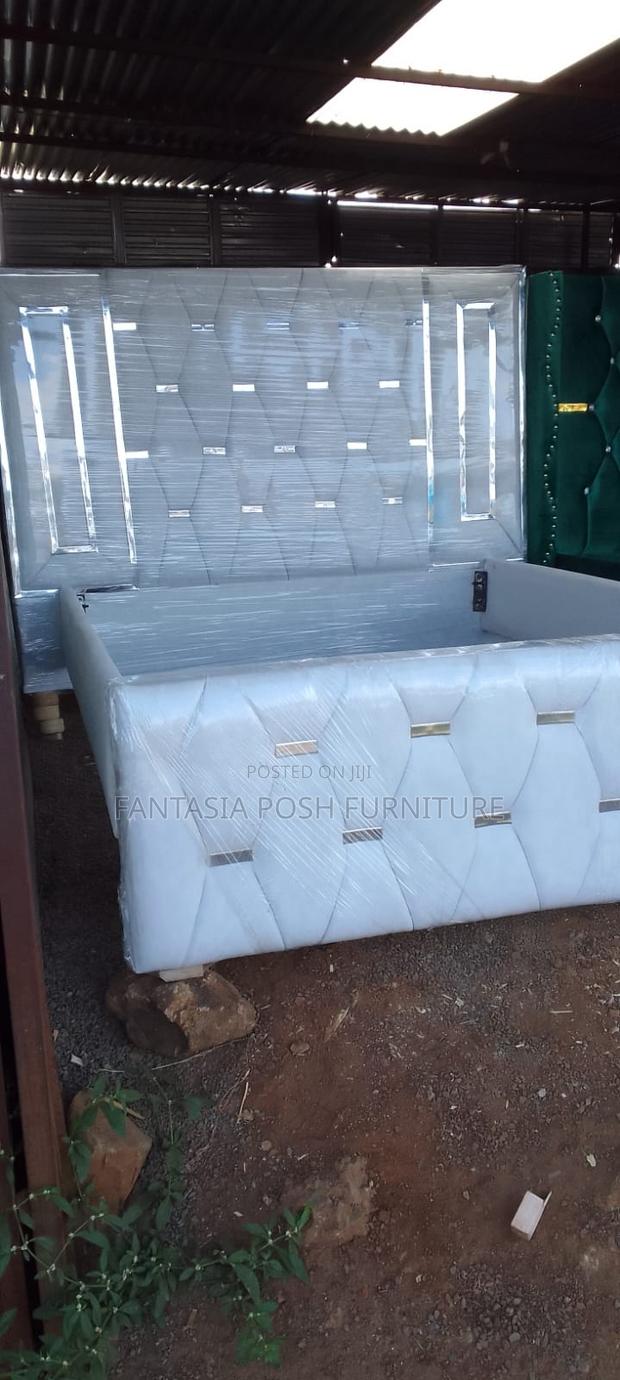 6*6 Diamond-Tufted White King Bed With Chrome Detailing