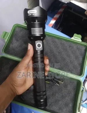 Waterproof Zooming Torch Which Uses Two 3.7v Batteries