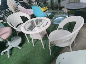 White Outdoor Table With Two Chairs