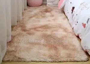 Brown Fluffy Carpet With White Patches