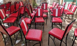 Restaurant Maroon Chairs With White Backrest Fabric.