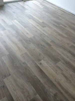 "Designed for Your Daily Grind!" SPC Flooring