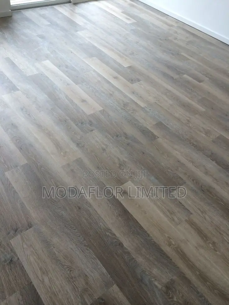 "Designed for Your Daily Grind!" SPC Flooring