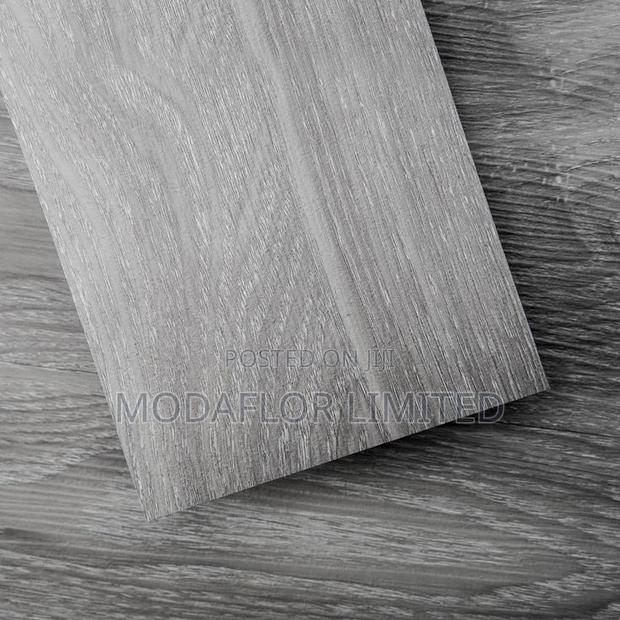 "Flooring Freedom in Every Box!" With Vinyl Self Adhesive