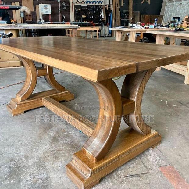 Curved Pedestal Dining Table