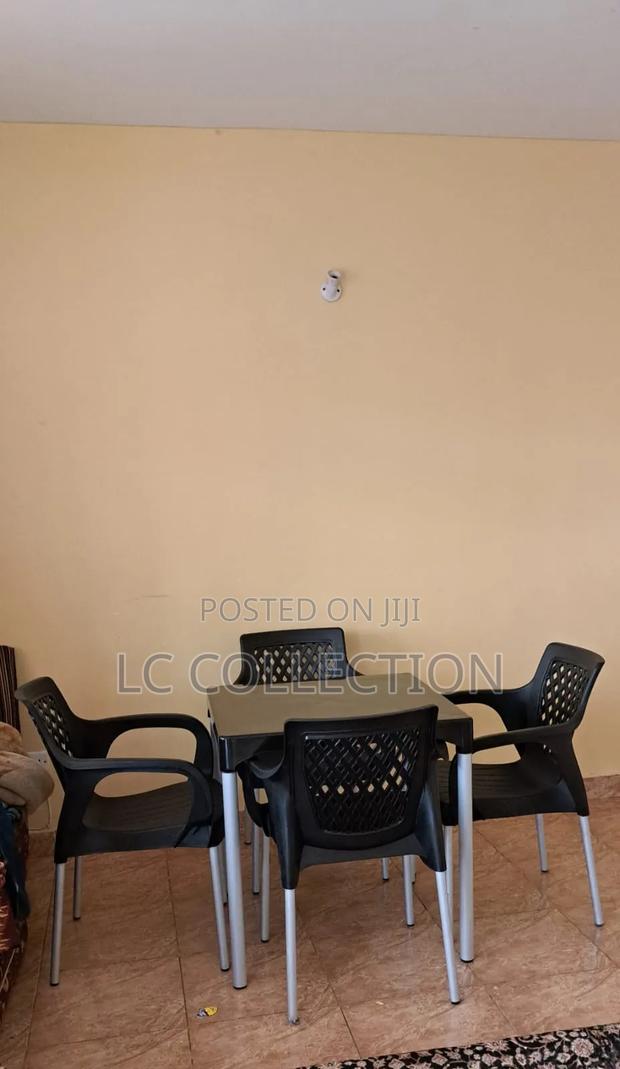 Black Chairs and Table Set