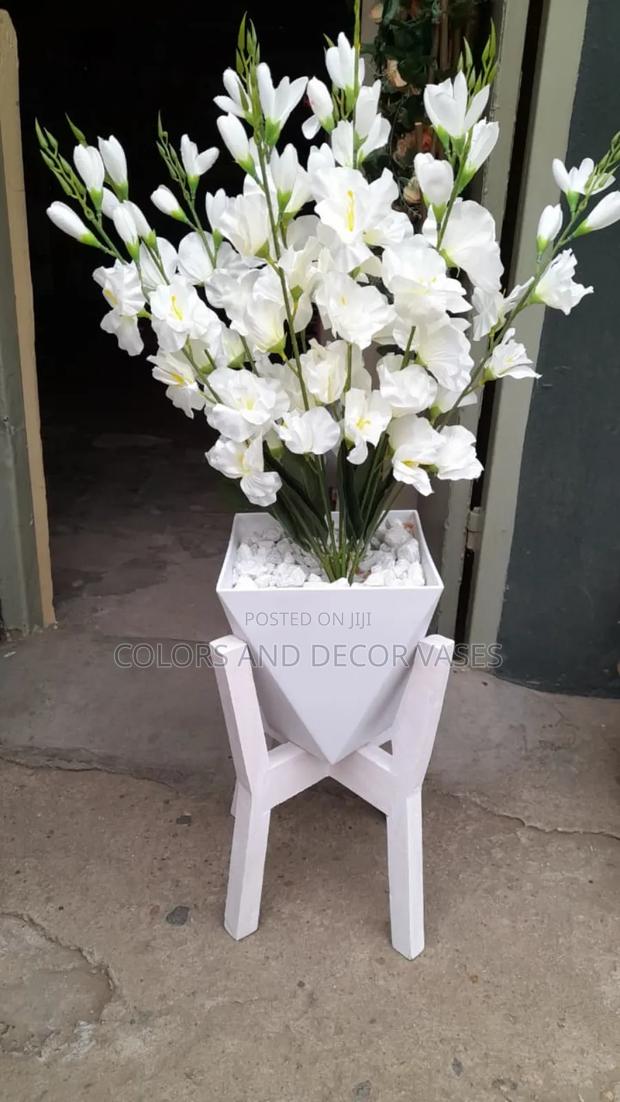 Vase With Flowers on Stand