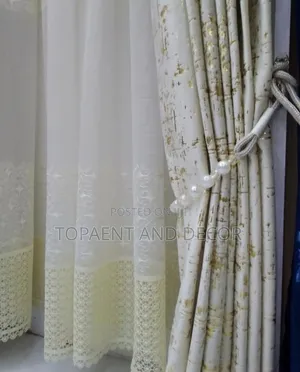 White Velvet Curtains With Beautiful Gold Patterns