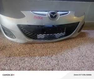 Demio Front Bumper 2012